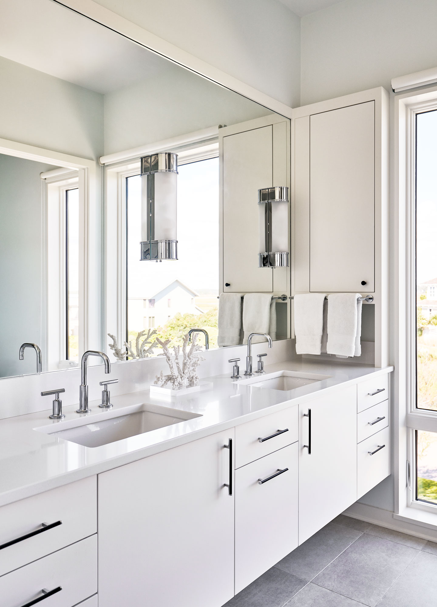 Modern bathroom with two sinks and large mirror